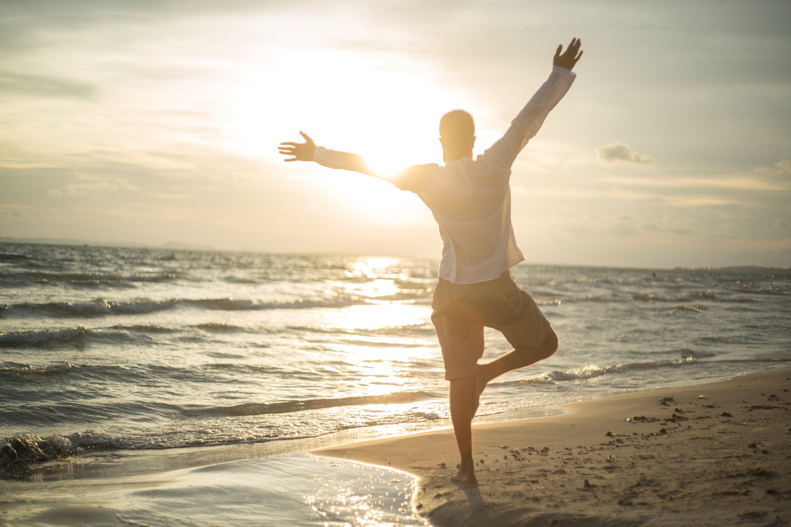 Balance and positive emotion-Man exercising yoga